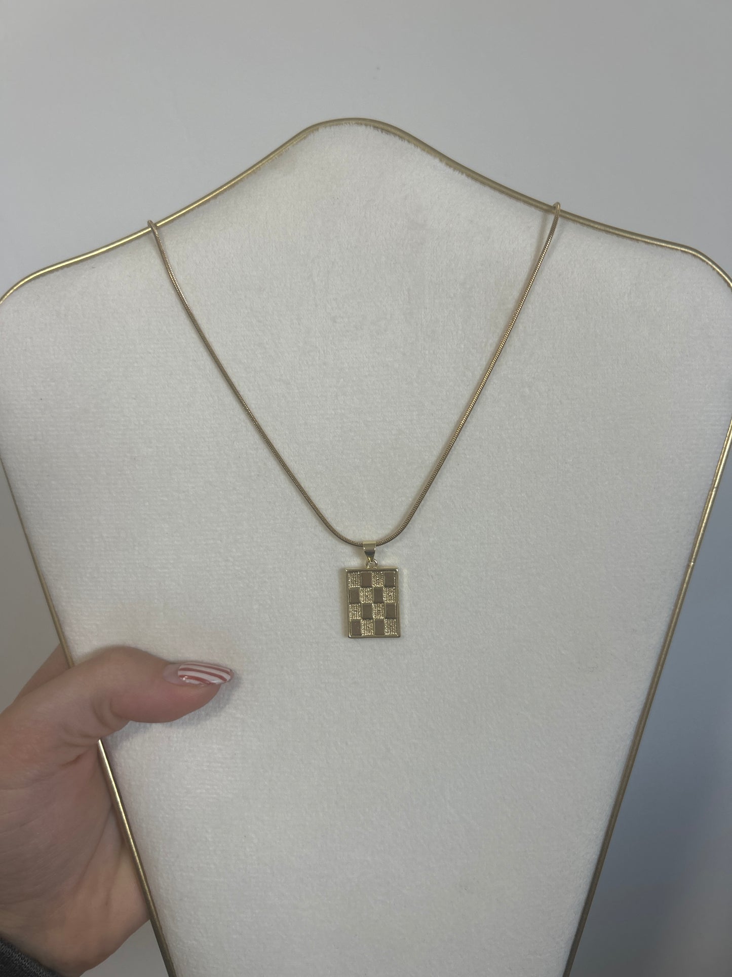 Gold checkered charm necklace